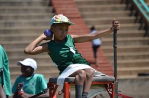 Child throwing a weight