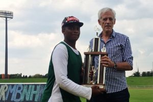 Winner posing with trophy